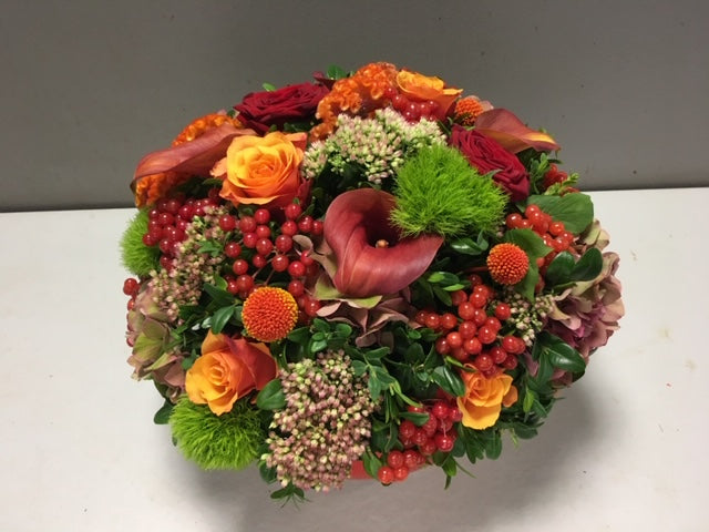 bloemstuk rond oranje herfstkleur