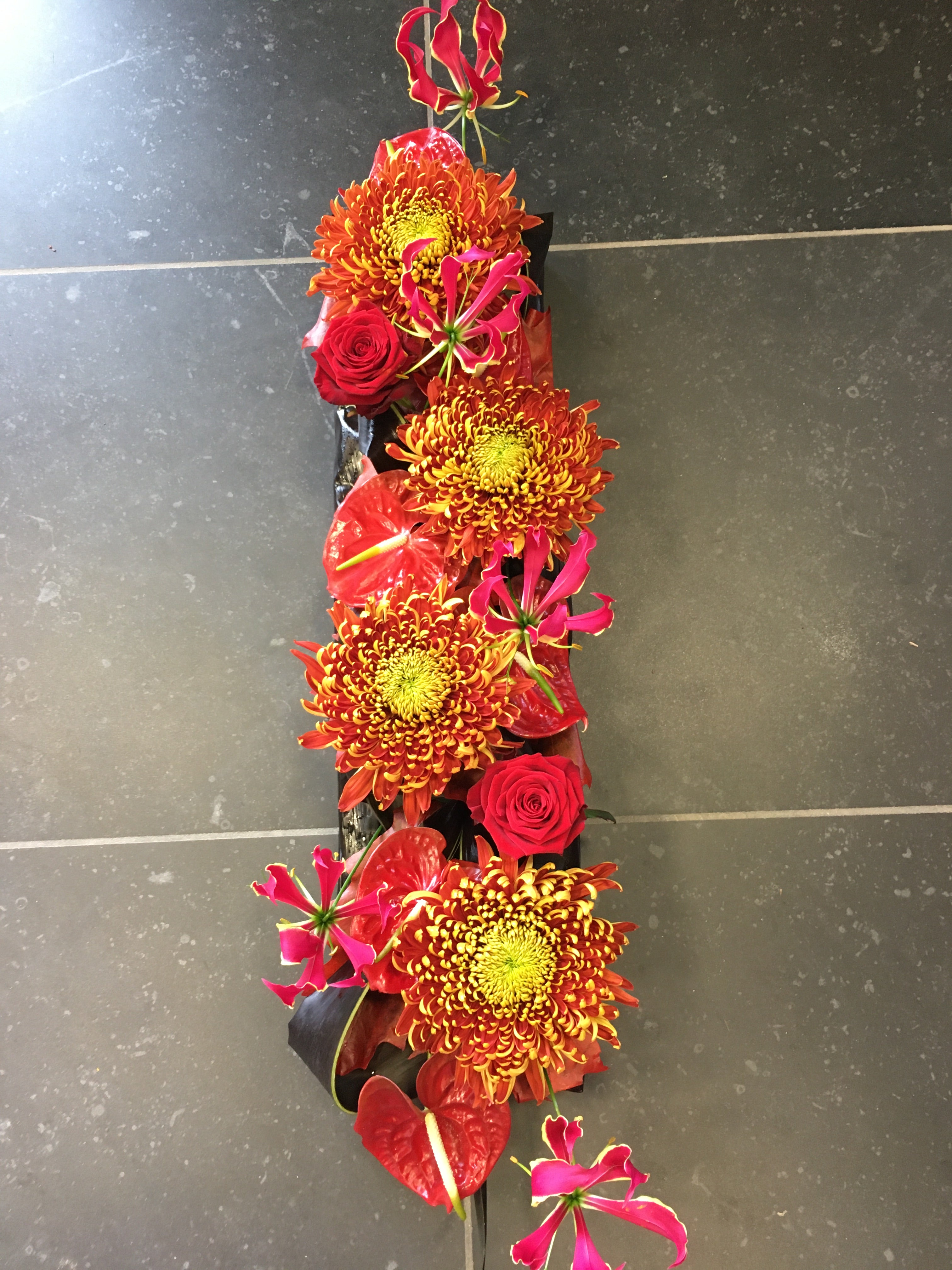 Bloemstuk autumn oranje