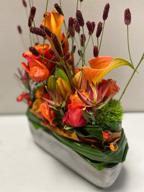 Bloemstuk oranje in de hoogte